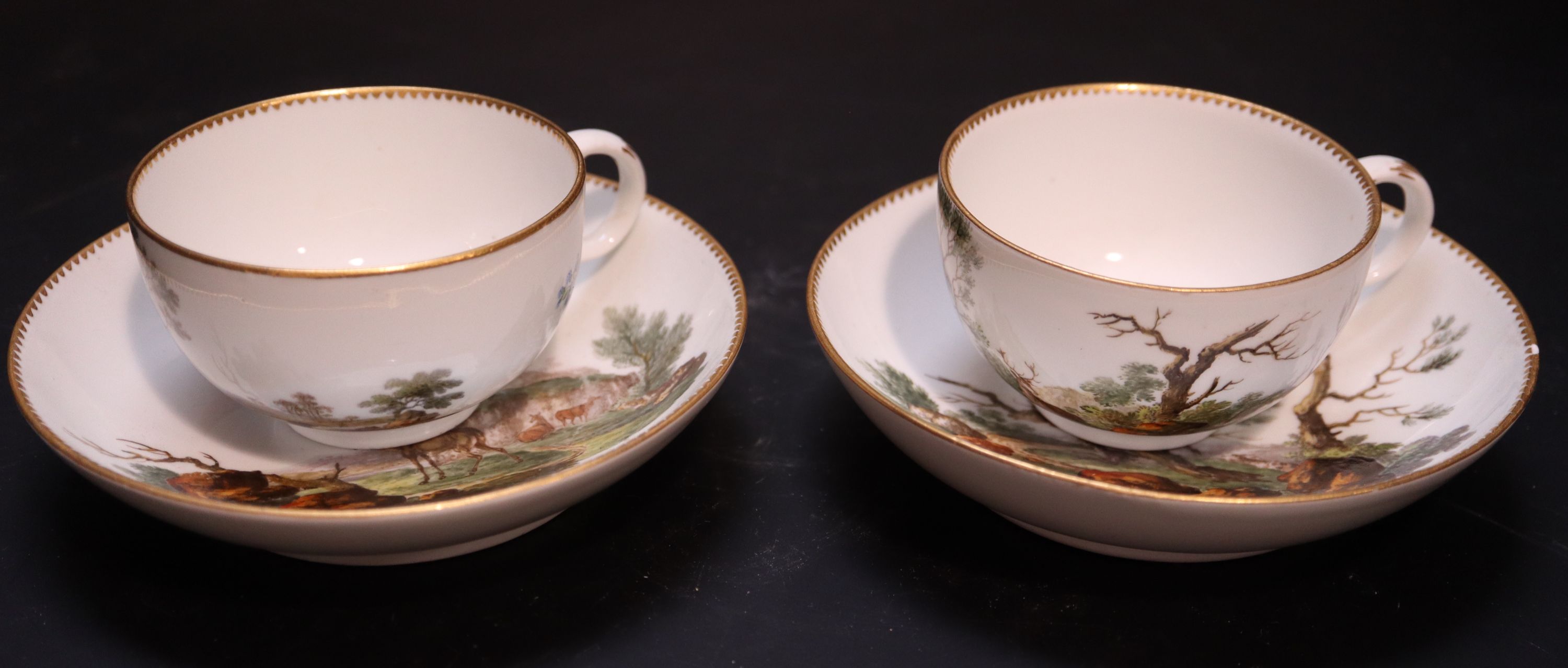 A pair of Meissen tea cups and saucers, saucers diameter 13cm